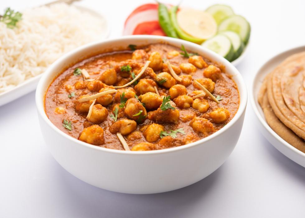 Tomatoes and cumin served with Laccha Paratha or roti.