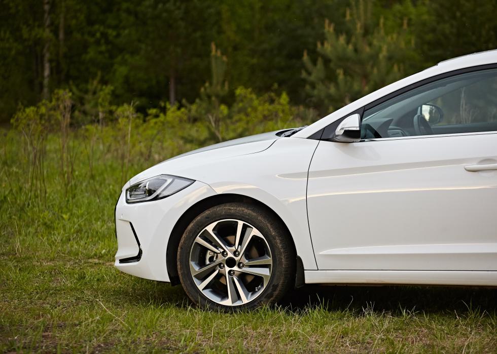 The front of a modern white car Hyundai Elantra.