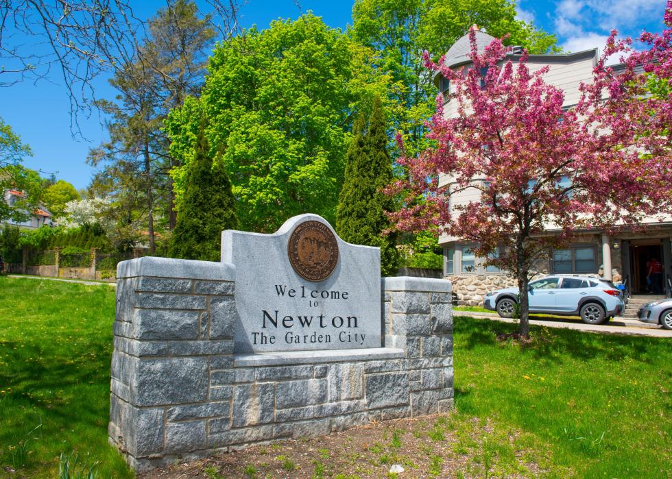 Welcome to Newton sign in spring on Commonwealth Avenue.