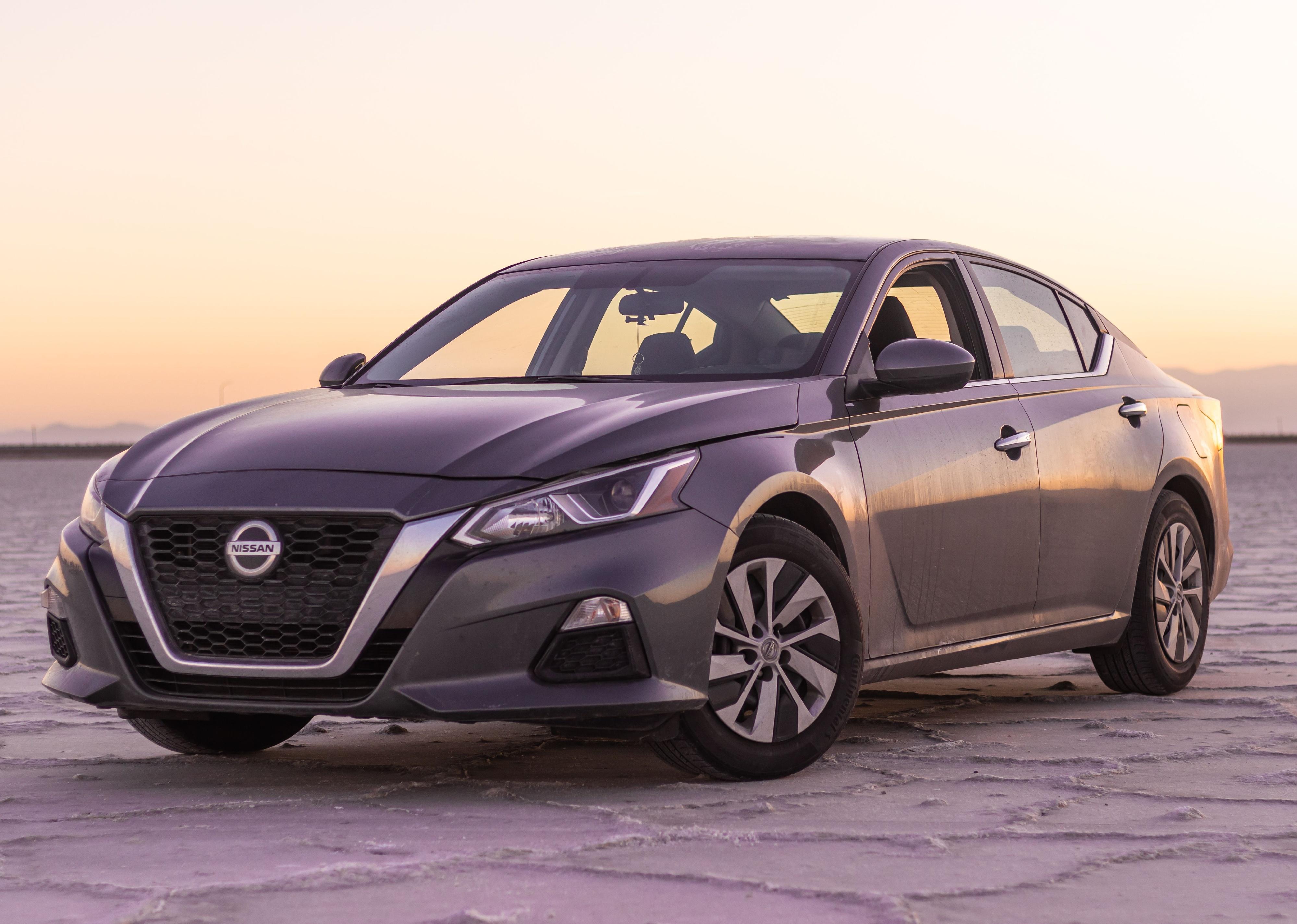 A brand new gray Nissan Altima 2 5 SR on the Bonneville Salt Flats.