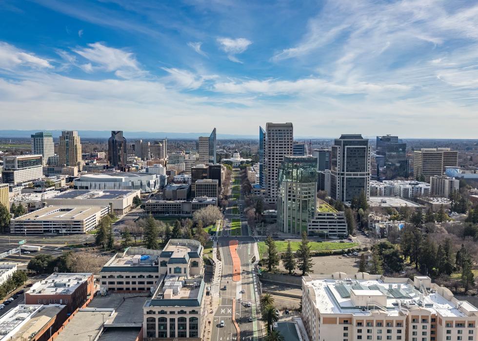 A city scape including the Tower Bridge and State Capitol Building in Sacramento.