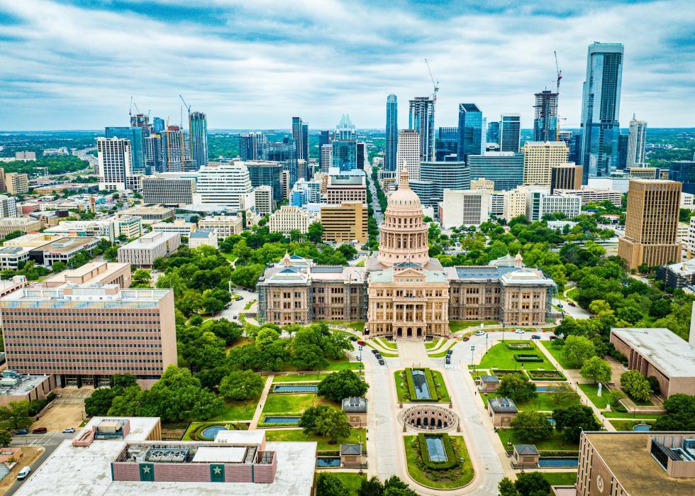 A city scape including tje Texas Capitol building in Austin.