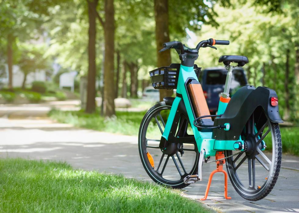 An e-bike parked in a park.