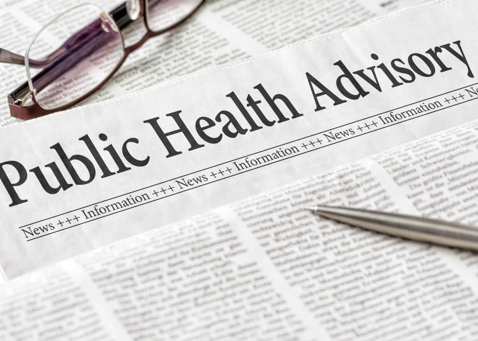 A newspaper with the headline Public Health Advisory.