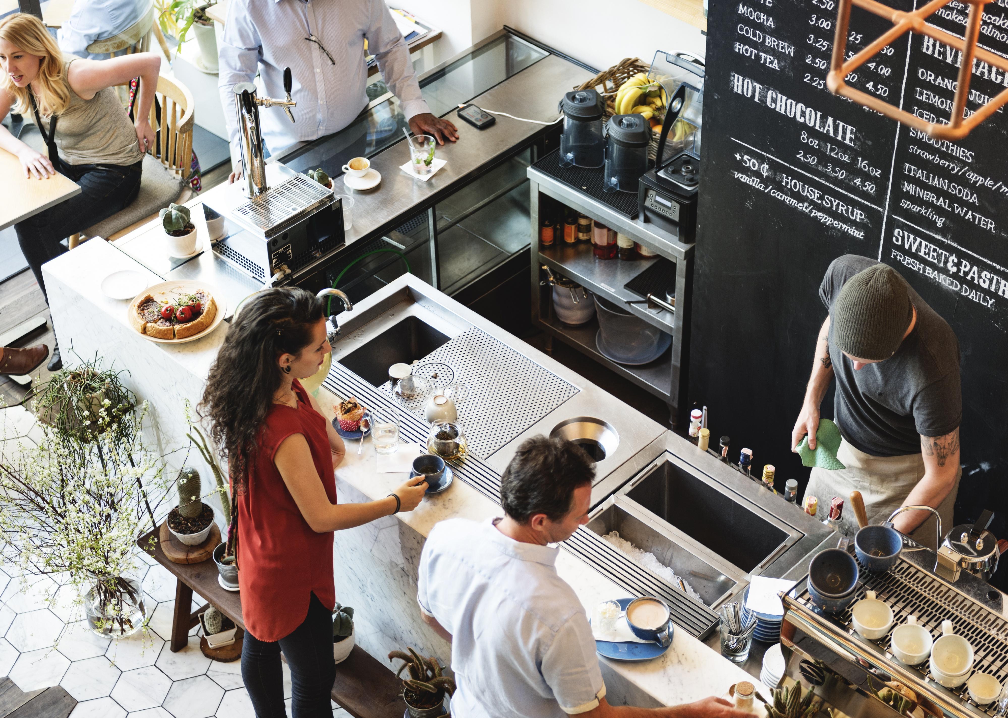 High view of coffee shop with customers.