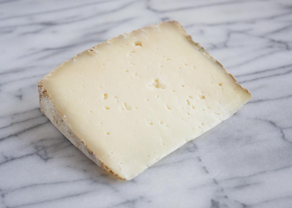 10 of the Smelliest Cheeses in the World (and Why They Stink) Stacker