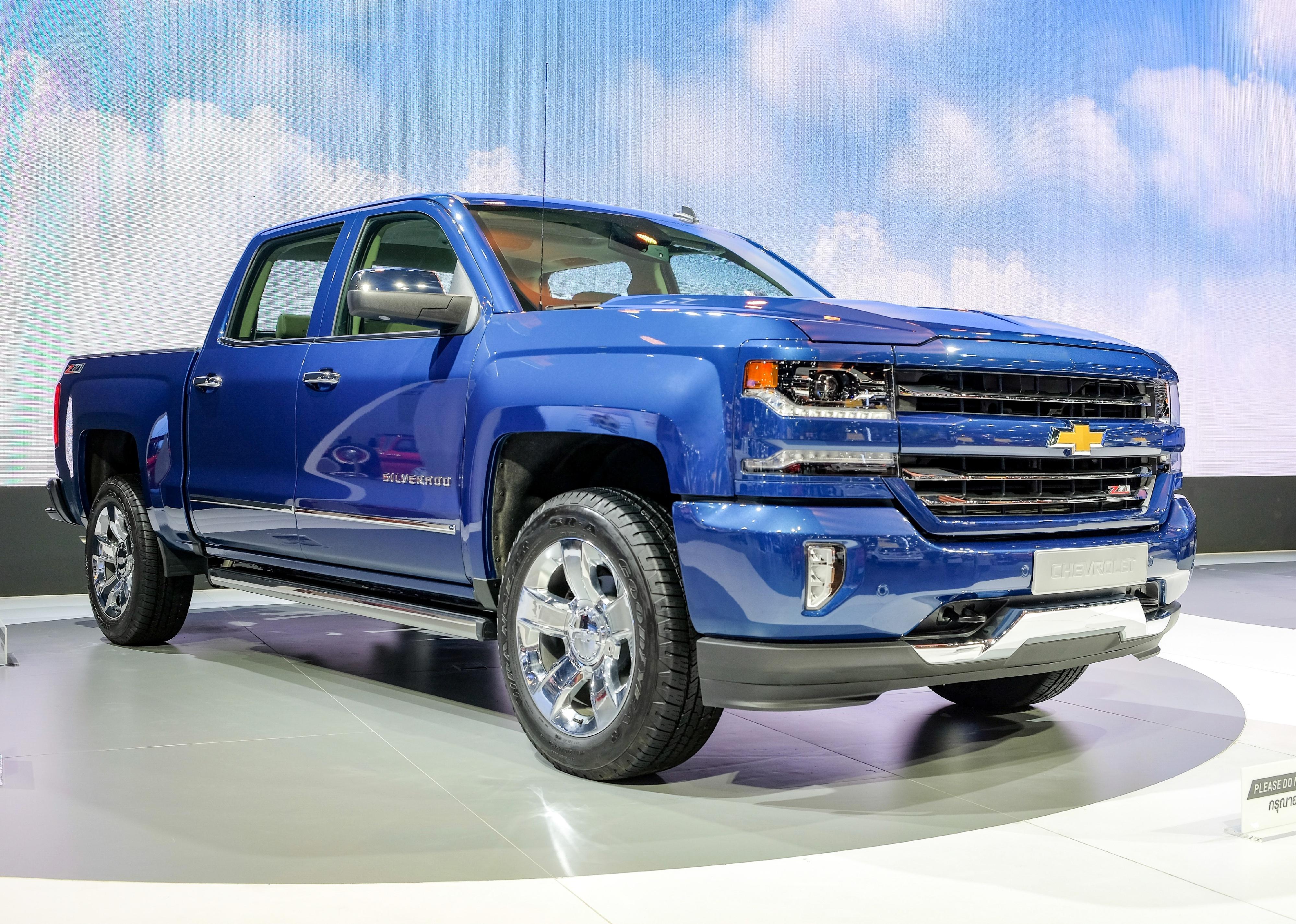 A blue Chevrolet Silverado on display.