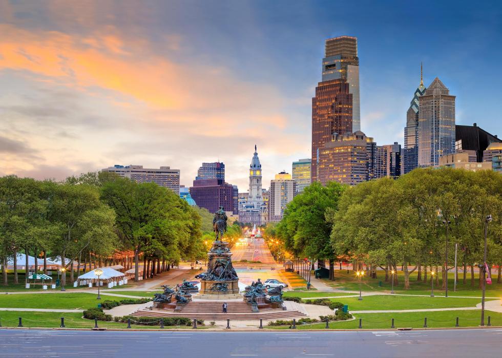 The Washington Monument facing Philadelphia City Hall at dusk.