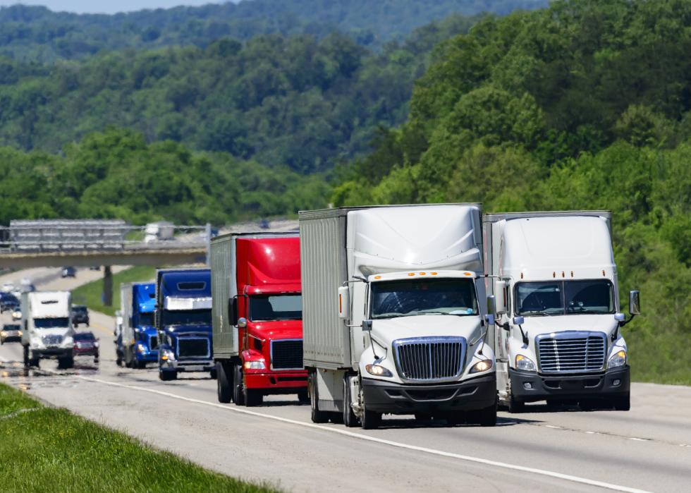 A squadron of eighteen-wheelers on an interstate highway in eastern Tennessee