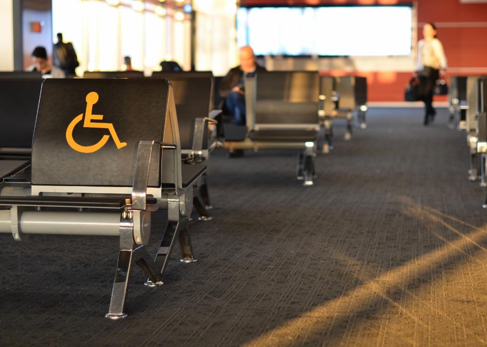 Chairs reserved for those with disabilities in an airport