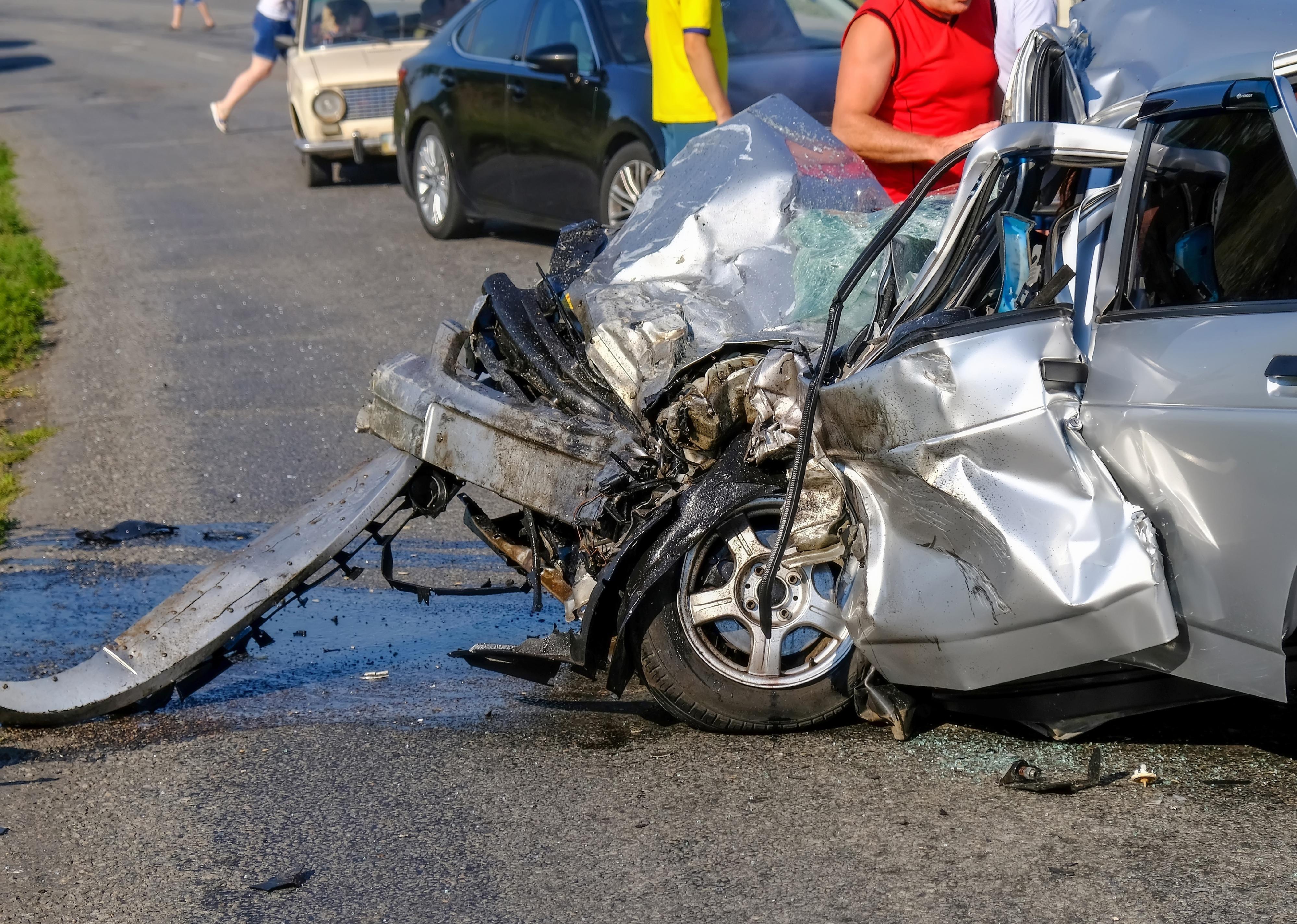 Damaged vehicle closeup after a car crash.