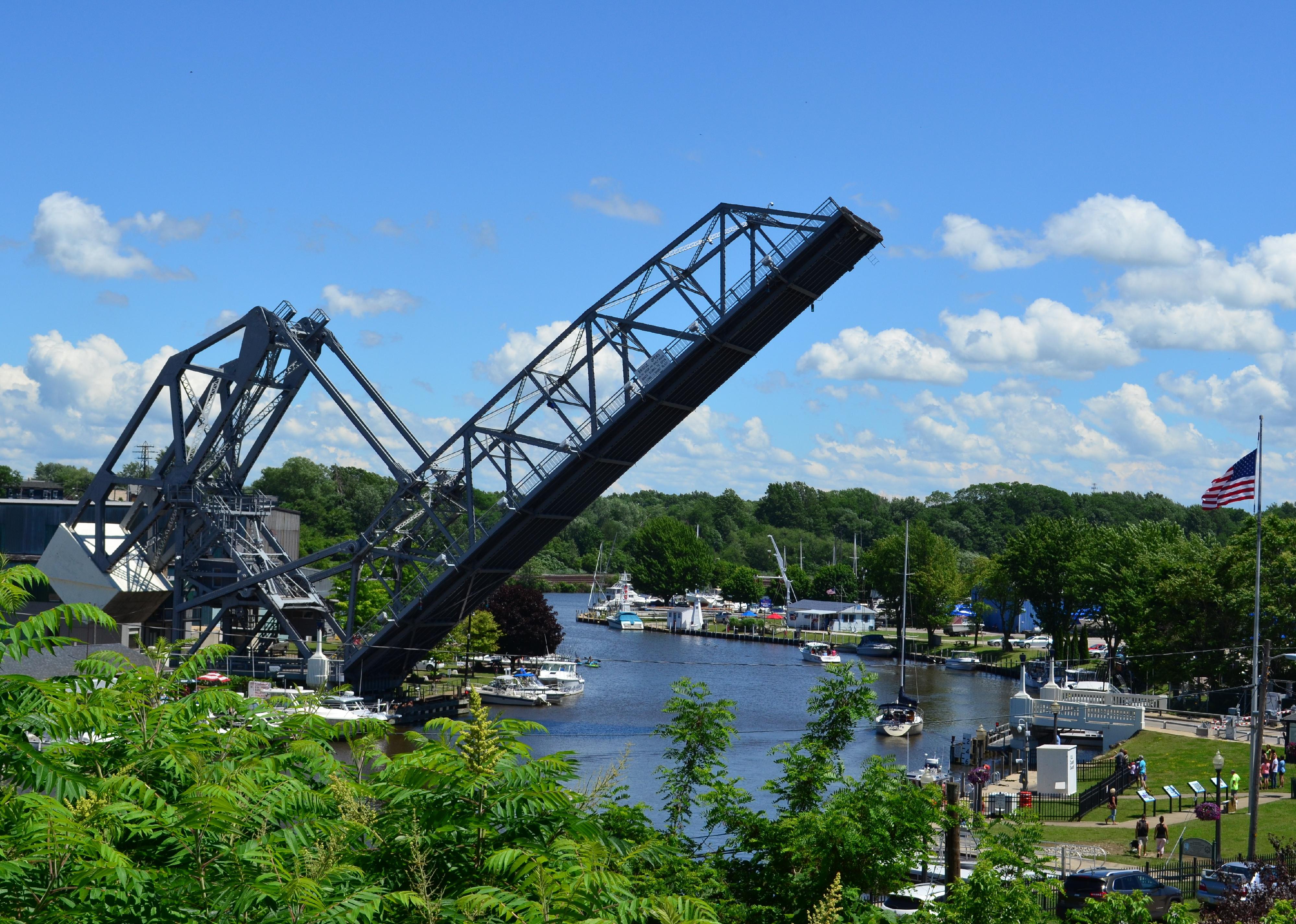 Historic Ashtabula Harbor lift bridge raised on a sunny Summer Day.