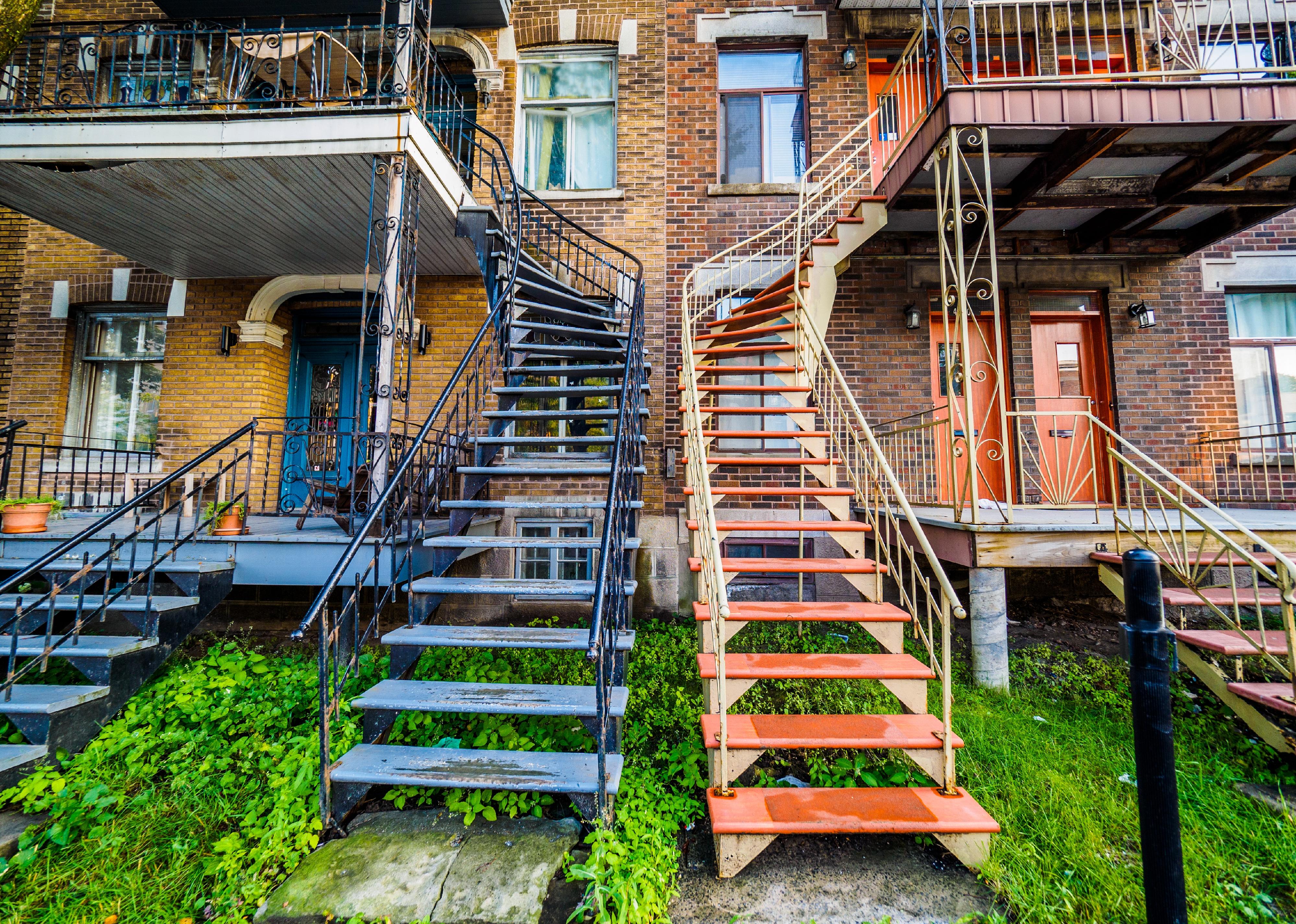 Montreal neighborhood street with staircases to apartments