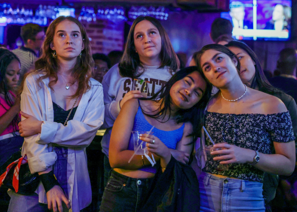 A group of girls watching the debate.