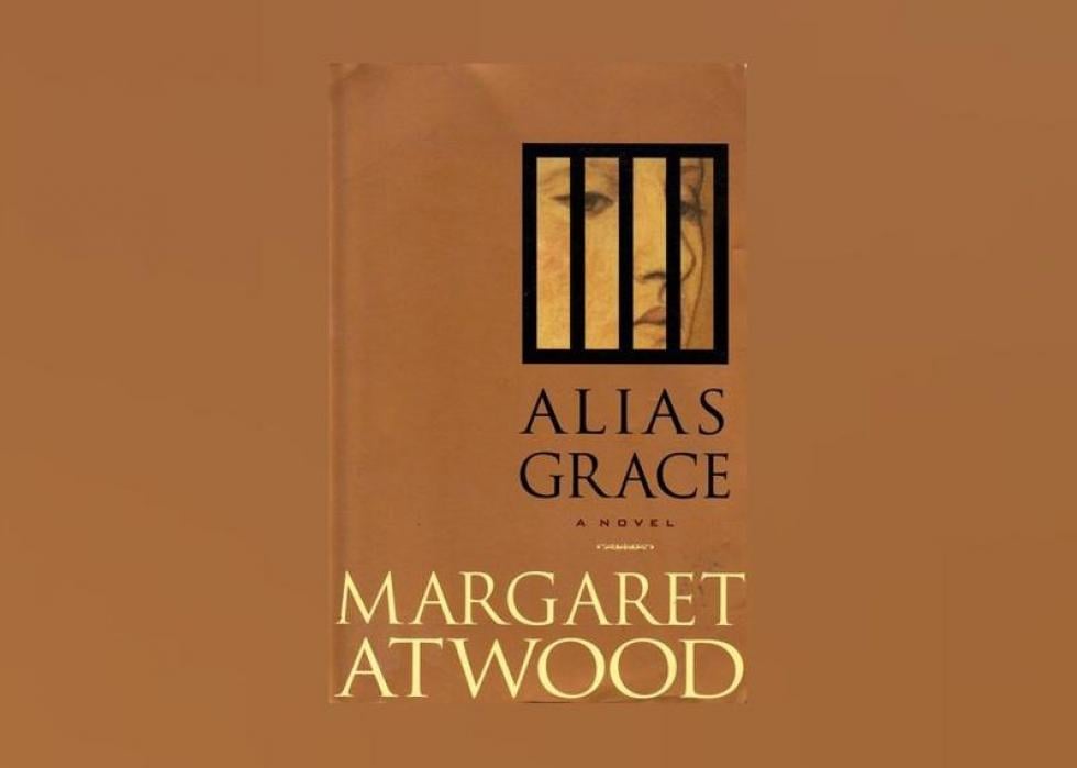 The cover shows the close-up of a women's face behind black bars. 