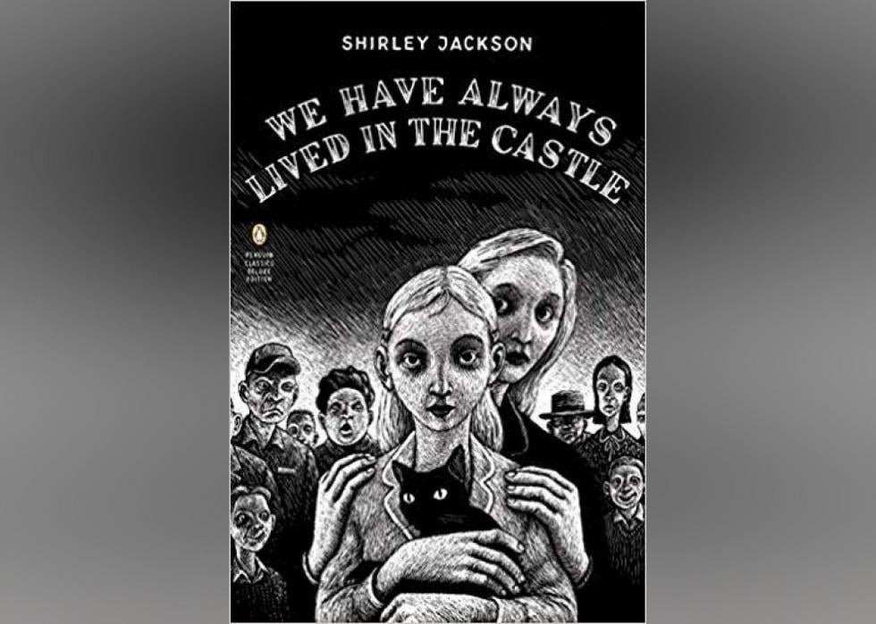 The ominous cover features a black and white cartoon-like illustration of a younger girl holding a black cat with an older girl standing behind her, with several boys and men behind them. 