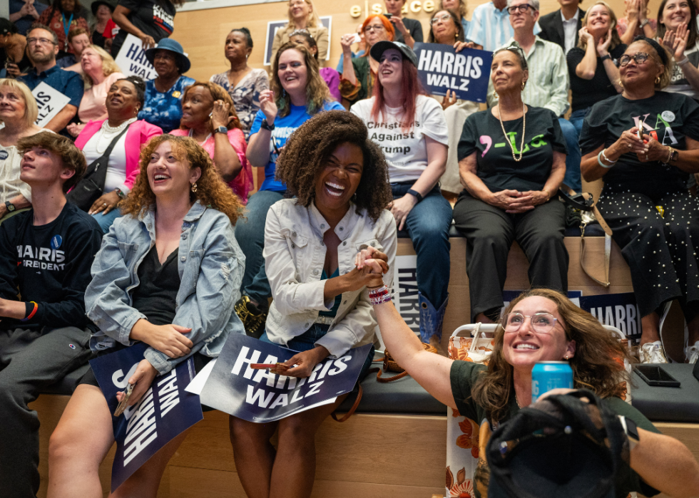 Harris supporters laughing.