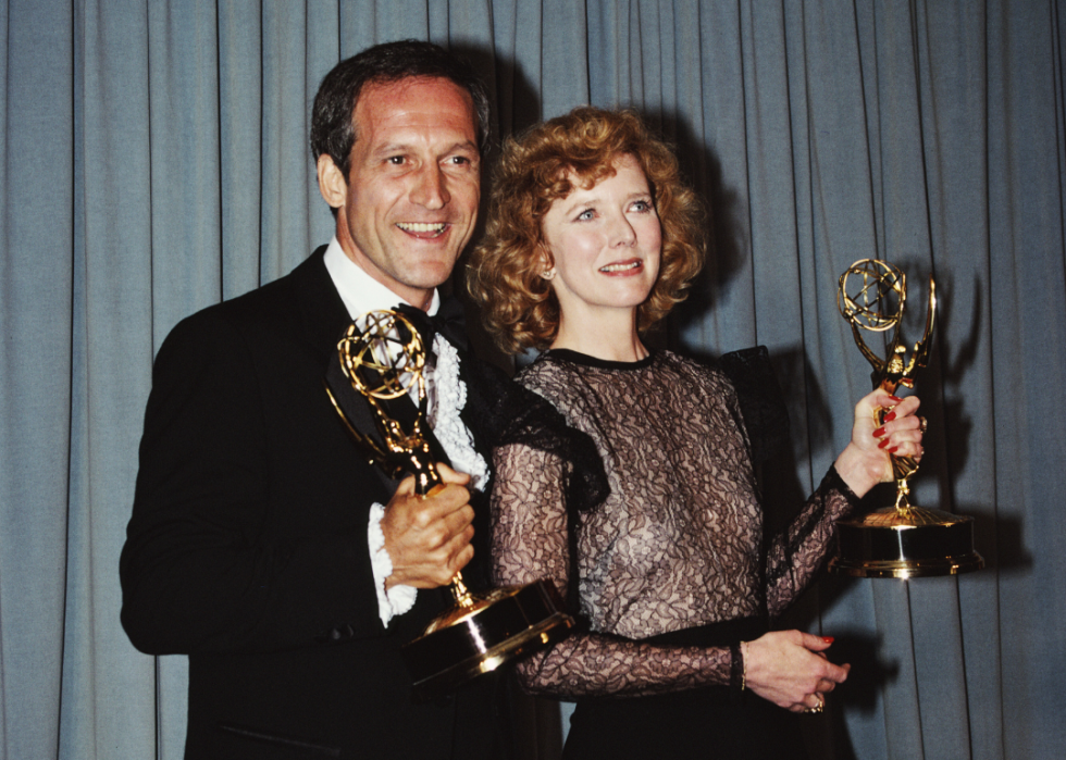 Daniel J Travanti and Barbara Babcock with their awards at the 33rd Primetime Emmy Awards.