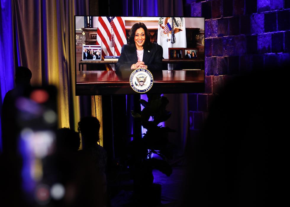 Kamala Harris speaks on screen at the Paid Leave for All Celebration at the U.S. Capitol on July 10, 2024.