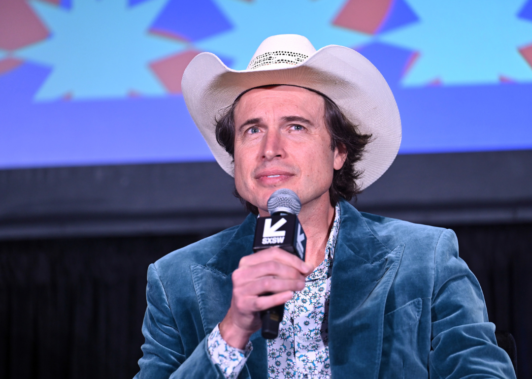 Kimbal Musk speaks onstage at event.