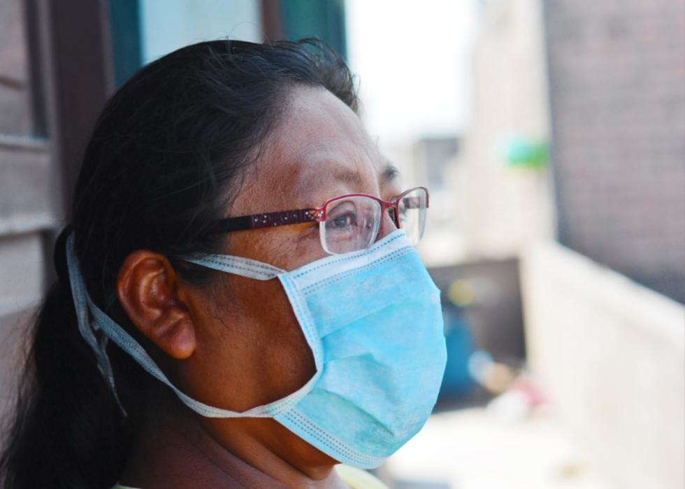 A woman wearing a mask.