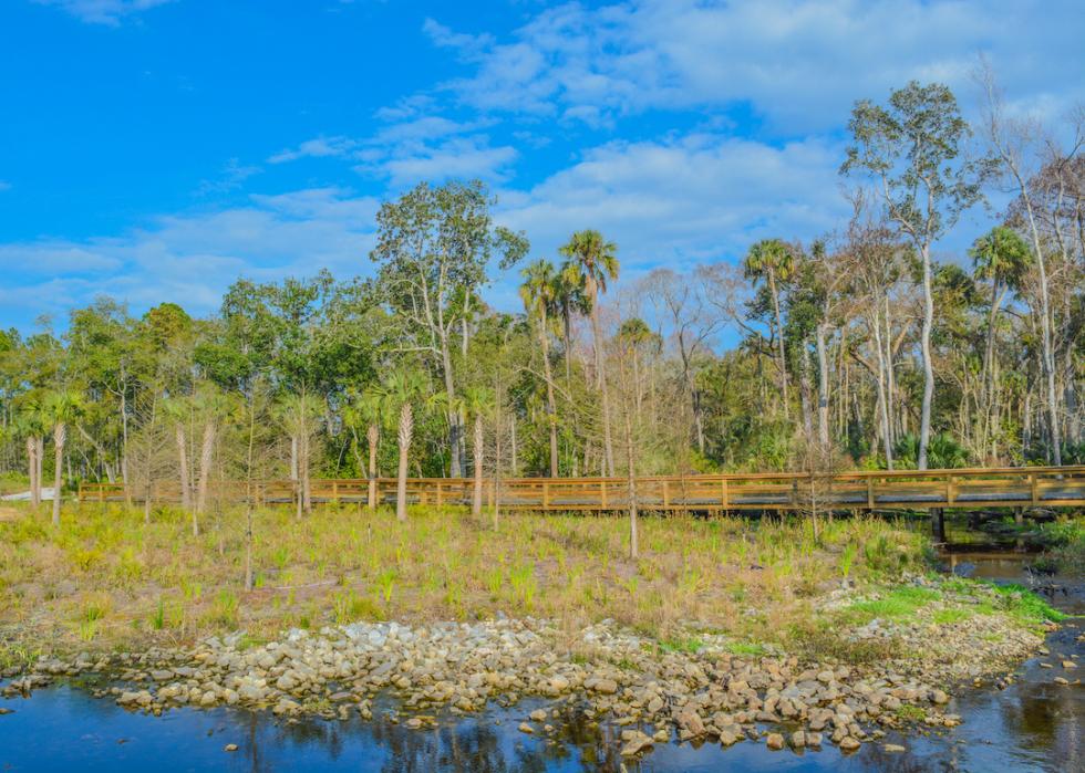 Stream flowing under walkway in Nocatee, Florida.