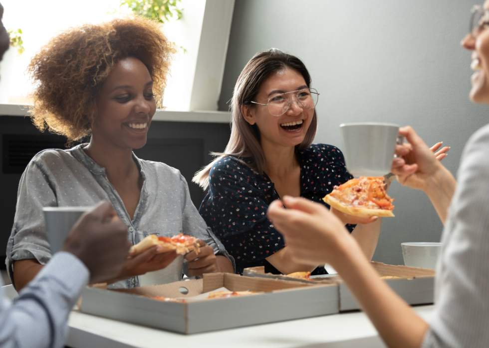 Coworkers enjoying a meal together.