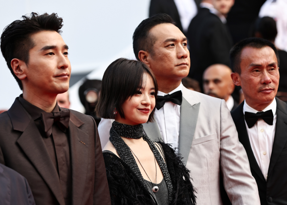 Cast members of the Chinese film 'Resurrection' pose upon their arrival at the red carpet of the closing ceremony of the 78th Cannes Film Festival in Cannes, France, May 24, 2025. 