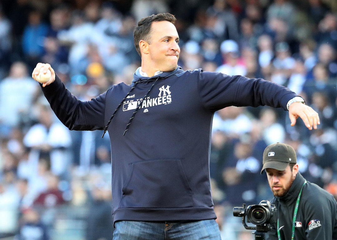 Mark Teixeira throws out a ceremonial first pitch at Yankee Stadium.