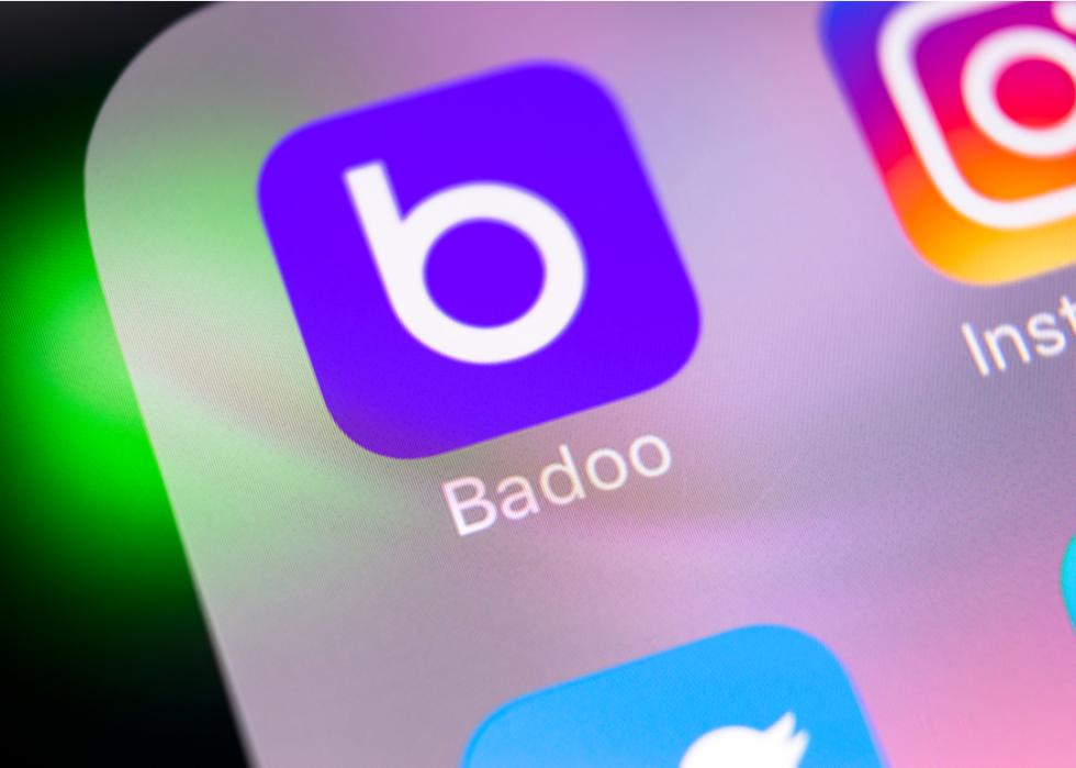 The Badoo application icon on Apple iPhone X screen
