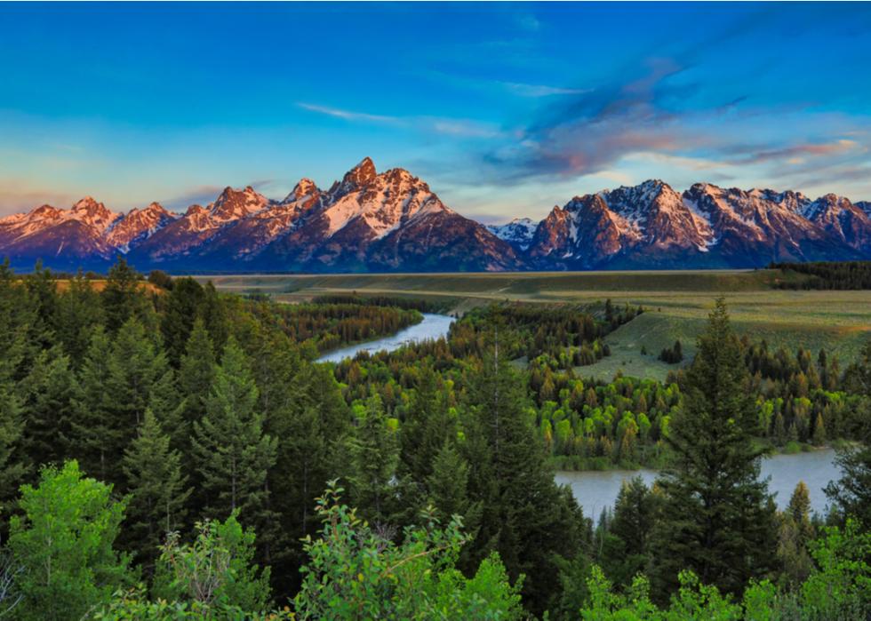 The Snake River Overlook in Wyoming, featuring the Grand Tetons in the background