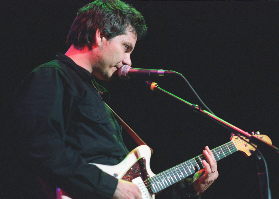 A guitarist performs. 