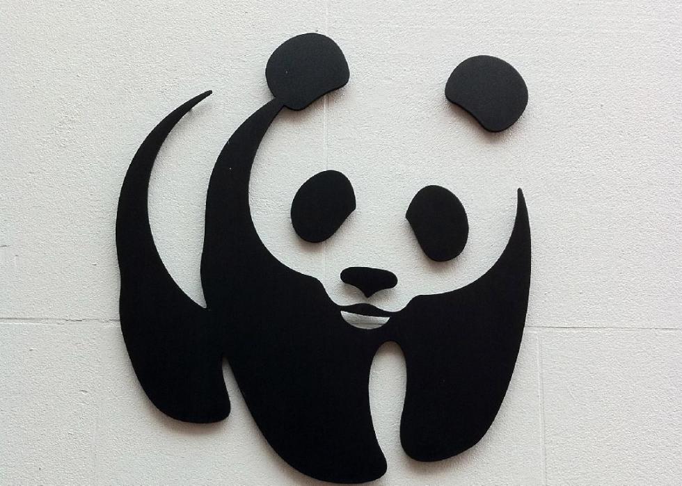Black cut-out logo of a panda pear.